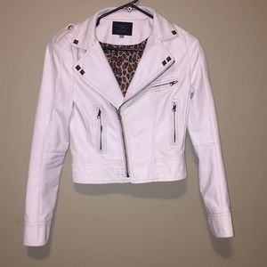 White faux leather jacket.